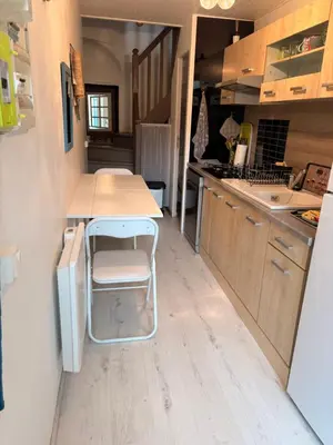 Cuisine ou kitchenette dans l'établissement La Victoire
