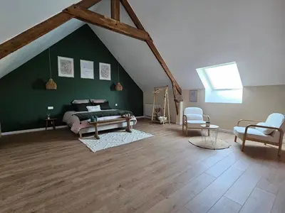 Coin salon dans l'établissement Gîtes Nos jours heureux - L'idylle, gîte de caractère