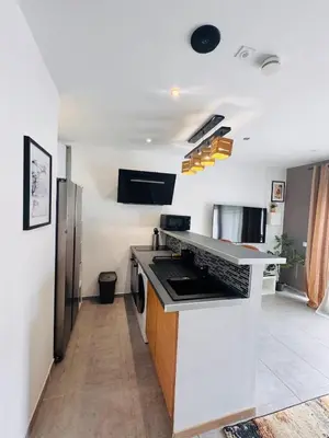Cuisine ou kitchenette dans l'établissement Loft Bis cosy proche des plages et villes
