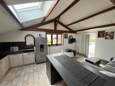 Cuisine ou kitchenette dans l'établissement Maison de Vacances du Bouquet