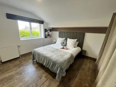 Un ou plusieurs lits dans un hébergement de l'établissement Maison de Vacances du Bouquet