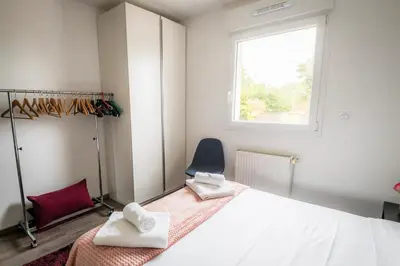 Un ou plusieurs lits dans un hébergement de l'établissement L'escale Ranvillaise - Maison 3 chambres - By Primo