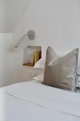 Un ou plusieurs lits dans un hébergement de l'établissement La Charretterie, studio cosy à 800 m de la mer Jardin exceptionnel by Maison Melchior
