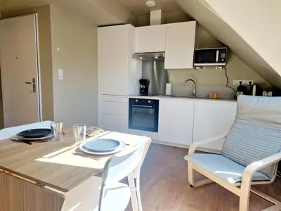 Cuisine ou kitchenette dans l'établissement L'Ermitage Cosy