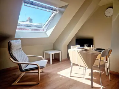 Coin salon dans l'établissement L'Ermitage Cosy