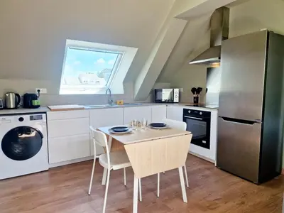 Cuisine ou kitchenette dans l'établissement L'Ermitage Smart