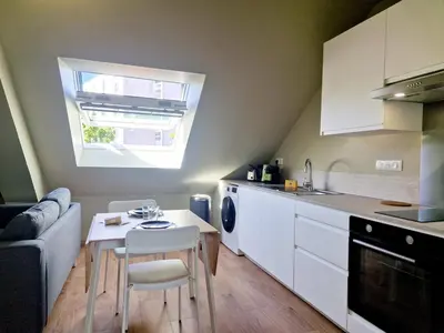 Cuisine ou kitchenette dans l'établissement L'Ermitage Scandi