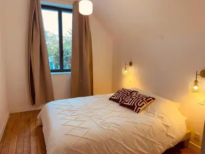 Un ou plusieurs lits dans un hébergement de l'établissement Maison Yodée