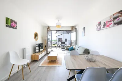 Coin salon dans l'établissement Le Coquillage - Joli T3 avec grand balcon