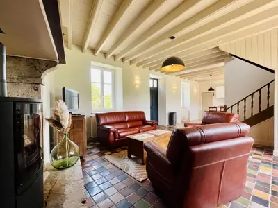 Coin salon dans l'établissement Le Clos du Haut Gallion An authentic haven of peace