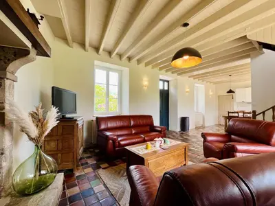 Coin salon dans l'établissement Le Clos du Haut Gallion An authentic haven of peace