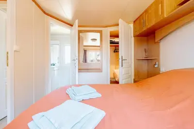 Un ou plusieurs lits dans un hébergement de l'établissement Mobile Home - 700m de la plage