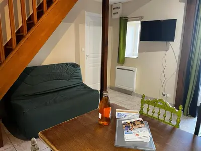 Télévision ou salle de divertissement dans l'établissement La maison Sainte Anne