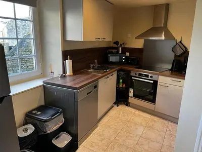 Cuisine ou kitchenette dans l'établissement La maison Sainte Anne