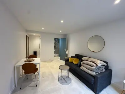 Coin salon dans l'établissement Appartement CAEN Saint Sauveur