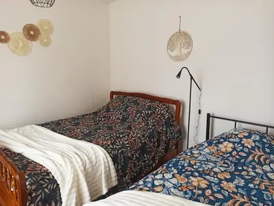 Un ou plusieurs lits dans un hébergement de l'établissement Gîte Traversière