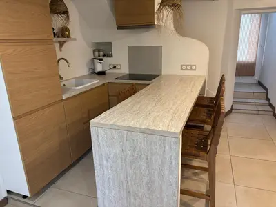 Cuisine ou kitchenette dans l'établissement Jolie Maison Proche Tous Commerces