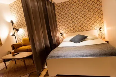 Un ou plusieurs lits dans un hébergement de l'établissement 4-person apartment, city center