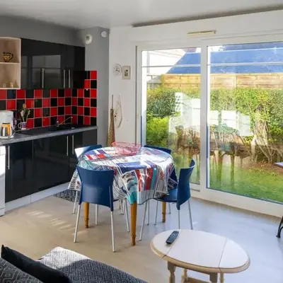 Appartement avec jardin et plage