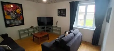 Télévision ou salle de divertissement dans l'établissement Villa du homard bleu
