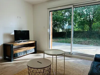 Télévision ou salle de divertissement dans l'établissement Maison de charme entre CABOURG et CAEN