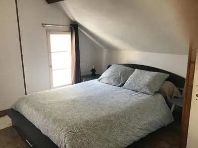 Un ou plusieurs lits dans un hébergement de l'établissement Maison De ville Bayeux