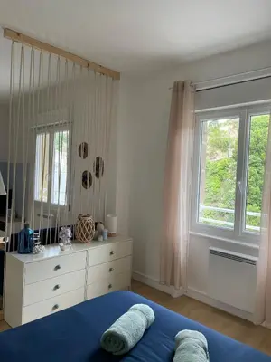 Un ou plusieurs lits dans un hébergement de l'établissement Appartement Port la Houle avec Parking privé à 5min à pied
