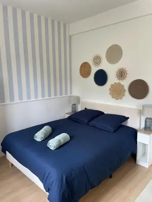 Un ou plusieurs lits dans un hébergement de l'établissement Appartement Port la Houle avec Parking privé à 5min à pied