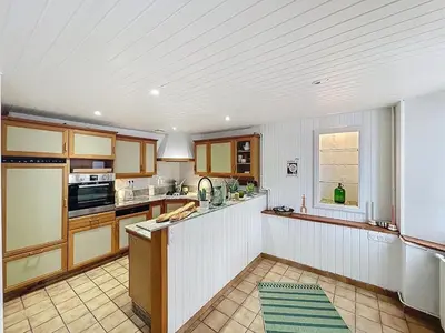 Cuisine ou kitchenette dans l'établissement Le patio des moussaillons 8 personnes