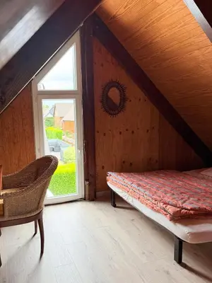 Un ou plusieurs lits dans un hébergement de l'établissement Le chalet des câlins canins