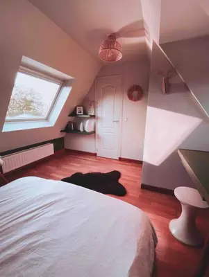 Un ou plusieurs lits dans un hébergement de l'établissement Maison avec grand jardin