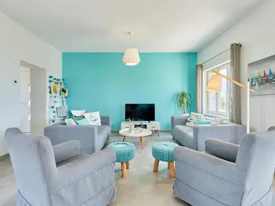 Coin salon dans l'établissement Holiday Home La Surprise by Interhome