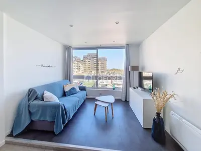 Un ou plusieurs lits dans un hébergement de l'établissement Appartement avec parking et WIFI près de la mer - FR-1-746-33