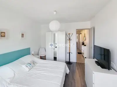 Un ou plusieurs lits dans un hébergement de l'établissement Appartement avec parking et WIFI près de la mer - FR-1-746-33