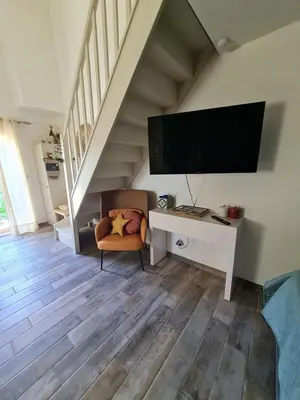 Télévision ou salle de divertissement dans l'établissement Dépendance entre CAEN et la mer