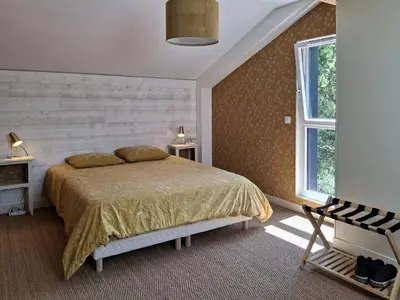 Un ou plusieurs lits dans un hébergement de l'établissement Maison familiale 3 chambres à 300m de la plage - FR-1-788-81