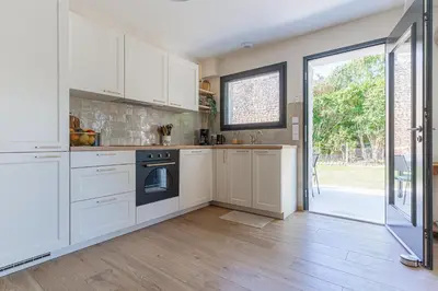 Cuisine ou kitchenette dans l'établissement La Maison du Martrait - Proche de la plage