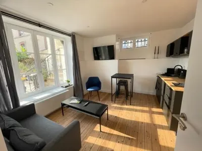 Télévision ou salle de divertissement dans l'établissement Appartement 2 Maison Dior, centre, plage à 500 m