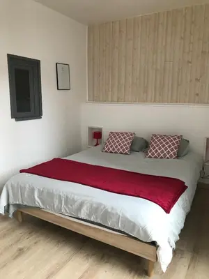 Un ou plusieurs lits dans un hébergement de l'établissement Port de la Houle vue mer - appartement 55 m2 - 1 chambre