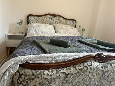Un ou plusieurs lits dans un hébergement de l'établissement Maison de Champeaux