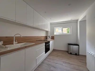 Cuisine ou kitchenette dans l'établissement Maison de charme sur la côte