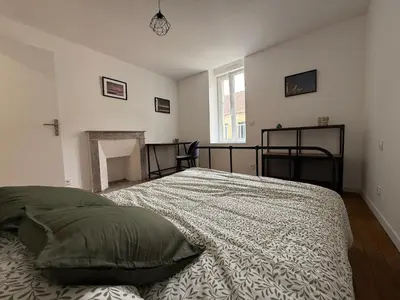 Un ou plusieurs lits dans un hébergement de l'établissement Maison de charme sur la côte