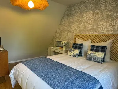 Un ou plusieurs lits dans un hébergement de l'établissement Appartement Duplex 2 Pièces Centre-Ville avec Balcon et Internet Inclus - FR-1-487-383