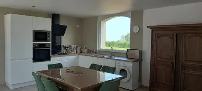 Cuisine ou kitchenette dans l'établissement Appartement spacieux à Monfréville avec terrasse