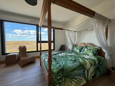 Un ou plusieurs lits dans un hébergement de l'établissement la maison de la mer