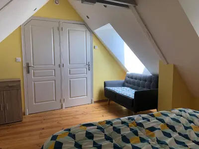 Coin salon dans l'établissement Gîte le Laurier