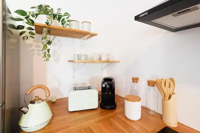 Cuisine ou kitchenette dans l'établissement Appartement Aloha - Proche du Port de Carteret