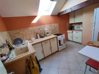 Cuisine ou kitchenette dans l'établissement Gîte calme La Closlière