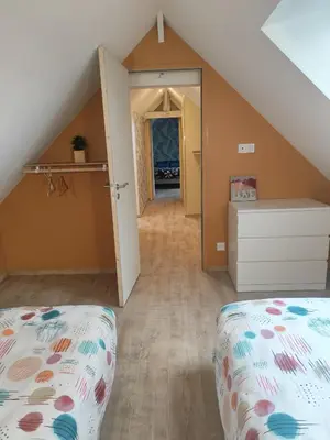 Un ou plusieurs lits dans un hébergement de l'établissement La maison à Nono