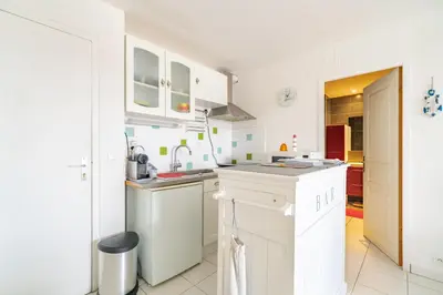 Cuisine ou kitchenette dans l'établissement L'Appart à L'Ouest - Face au port